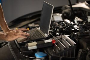 Car Mechanic Checking Diagnostic Codes in Brisbane