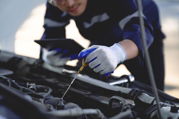 Car Mechanic Preparing Car for Road Trip in Brisbane